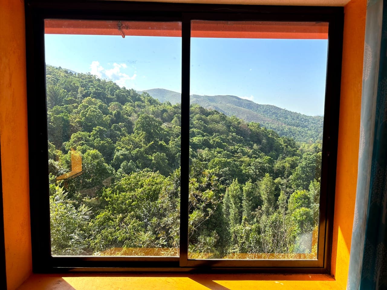Kudremukh National Park forest and hills seen through a room window